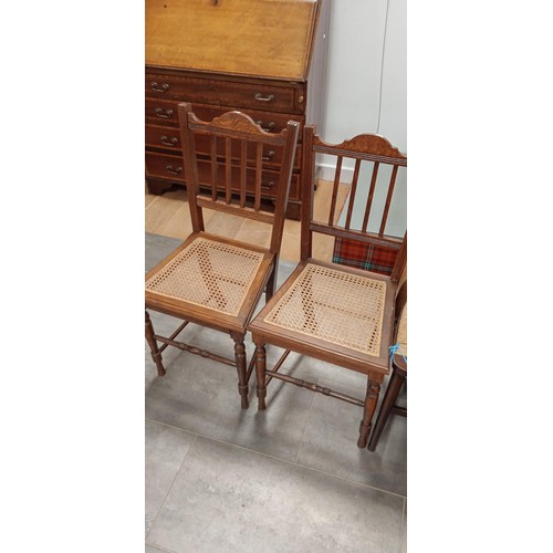 257 - 2 Reed & 2 wicker chairs