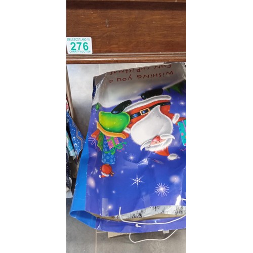 276 - Christmas wrapping paper and Christmas bags