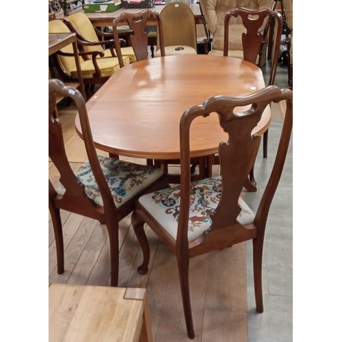 294 - Folding double leafed gate leg dining table plus 4 chairs