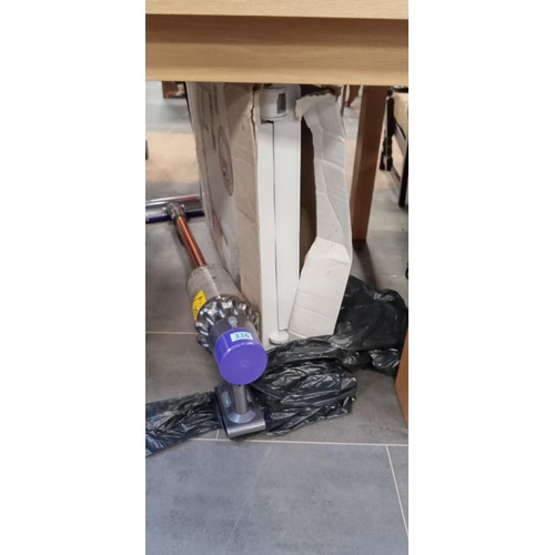 336 - Dyson cyclone V10 handheld vacuum cleaner with charger plus deluxe decorating table