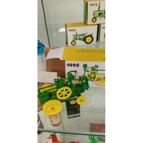 32 - 8 John Deere made in USA miniature tractors mainly in boxes