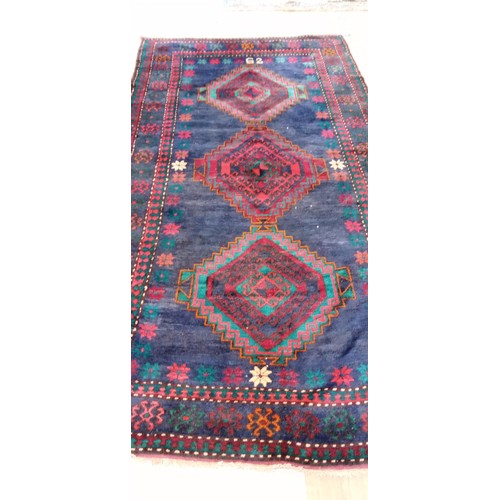 38 - Handmade Azerbaijan rug dated 1960 blue field with 3 medallions 280cm x 145cm approx.