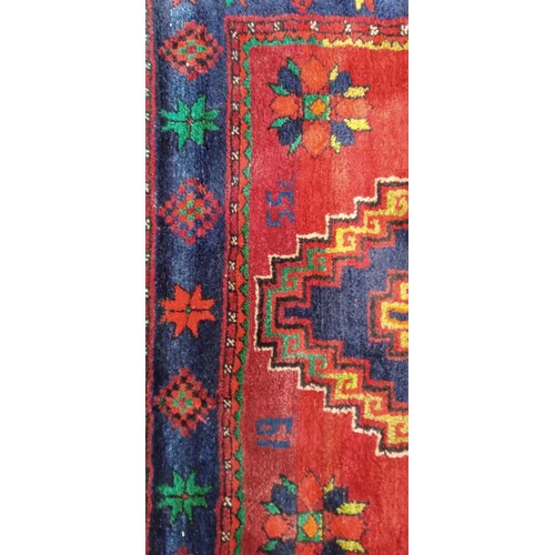 40 - Handmade Azerbaijan rug dated 1955 red field with 2 medallions with a nice border 245cm x 140cm appr... 