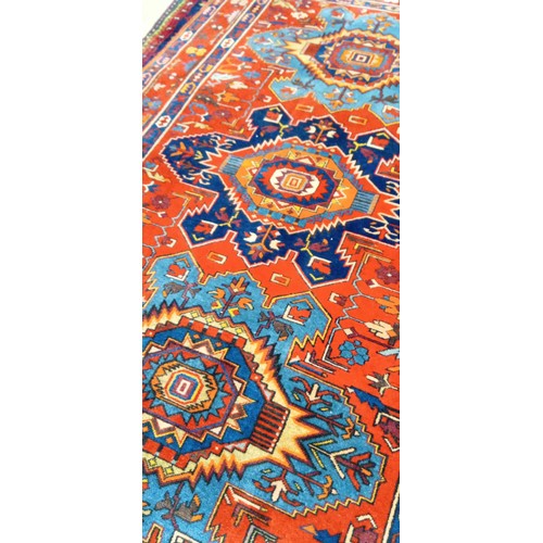 41 - Handmade Azerbaijan rug orange field 3 intricate patterned medallions 225cm x 130cm approx.