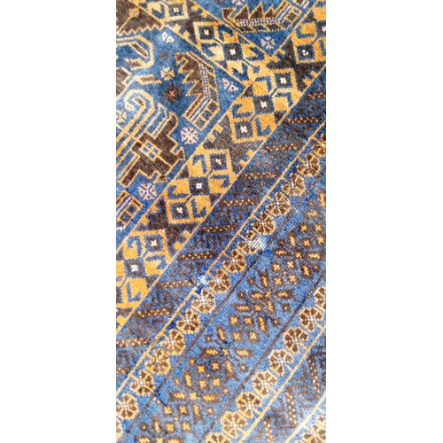 44 - Handmade Azerbaijan rug blue field with lovely detailed design has been moth bitten 200cm x 103cm ap... 