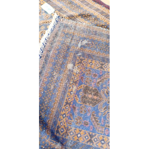 44 - Handmade Azerbaijan rug blue field with lovely detailed design has been moth bitten 200cm x 103cm ap... 