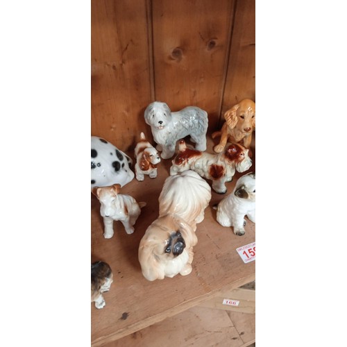 159 - Selection of ceramic dogs