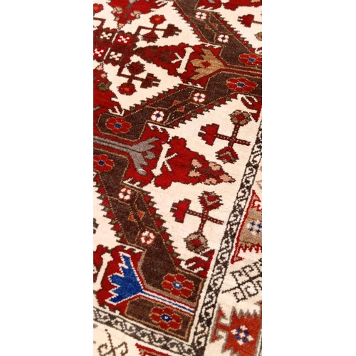 220 - Handmade Azerbaijan rug beige field green & red Caucasian motifs 117cm x 85cm approx.