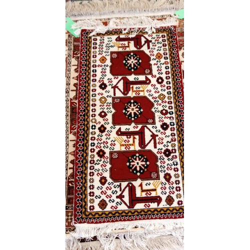 221 - Handmade Azerbaijan rug beige field with animal and geometric motifs 108cm x 53cm approx.