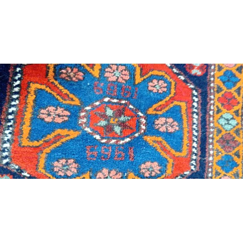 222 - Handmade Azerbaijan 1969 small rug blue field and multi coloured pom pom fringe 80cm x 80cm approx.