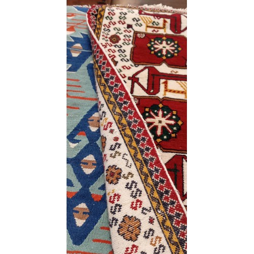 224 - 2 Handmade Azerbaijan rugs 1 Beige field with animal motifs 105cm x 53cm approx. and flat weave kili... 