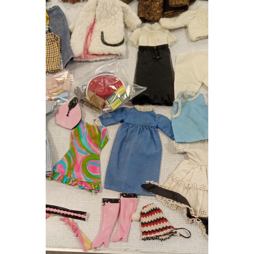 17 - Large selection of vintage Barbie, Sindy & doll clothing