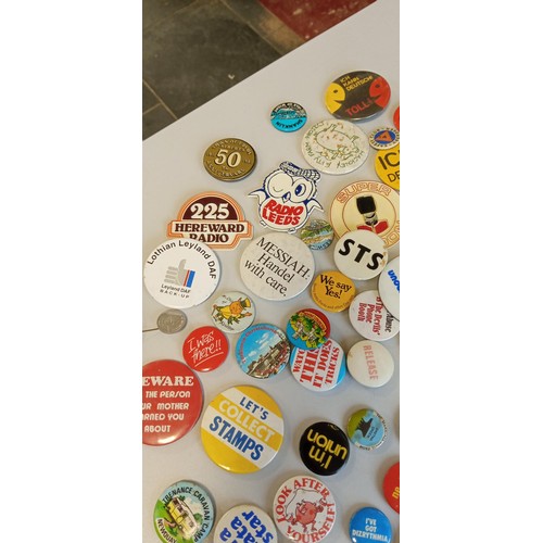 24 - Selection of vintage badges on places and slogans mainly