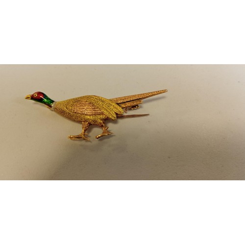 25 - 15 carat gold stamped pheasant brooch weighs 4g approx.