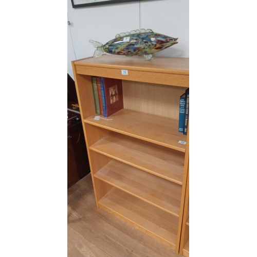 10 - Wooden bookcase measures 122 H x 75cm W x 30cm D