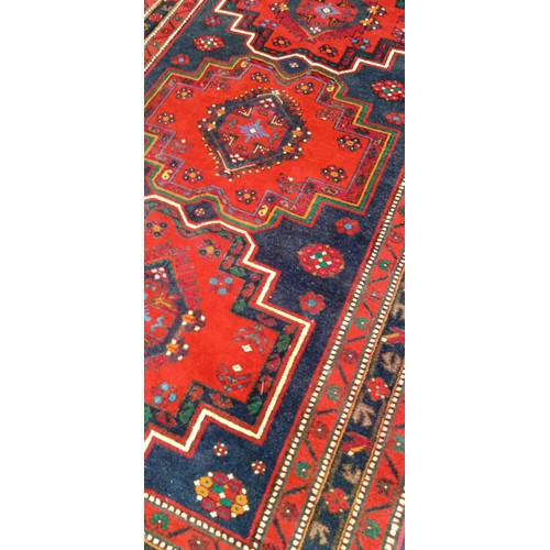 41 - Handmade Azerbaijan rug blue field red medallions Afghan tribal  slight moth bitten 228x138cm approx... 