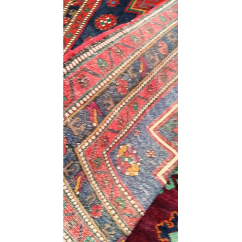 41 - Handmade Azerbaijan rug blue field red medallions Afghan tribal  slight moth bitten 228x138cm approx... 