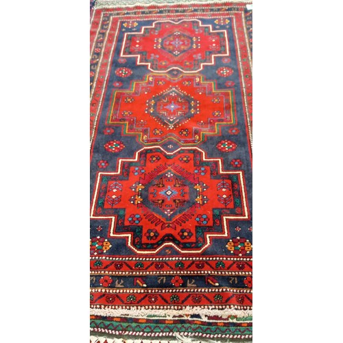 41 - Handmade Azerbaijan rug blue field red medallions Afghan tribal  slight moth bitten 228x138cm approx... 