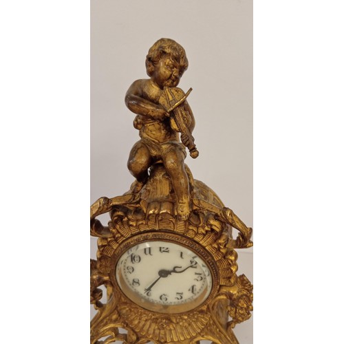 25 - Early Waterbury cherub/ ornate Victorian brass clock USA