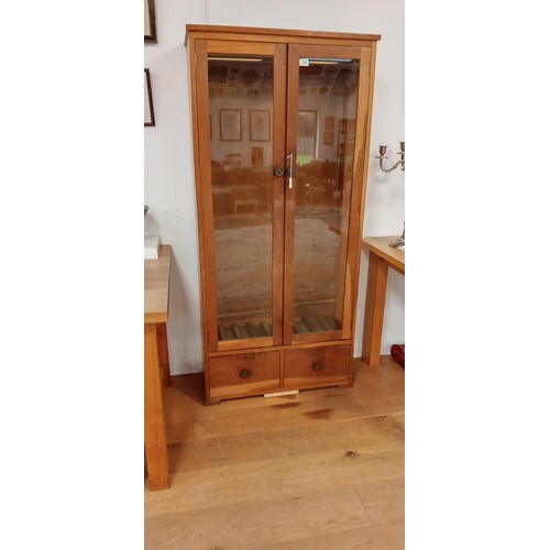 34 - Teak glass fronted display cabinet with 2 drawers