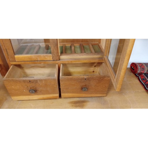 34 - Teak glass fronted display cabinet with 2 drawers