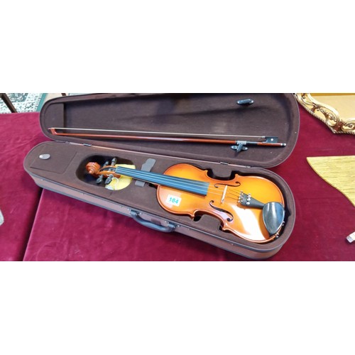 184 - Violin in its original case with bow by Cath Coral