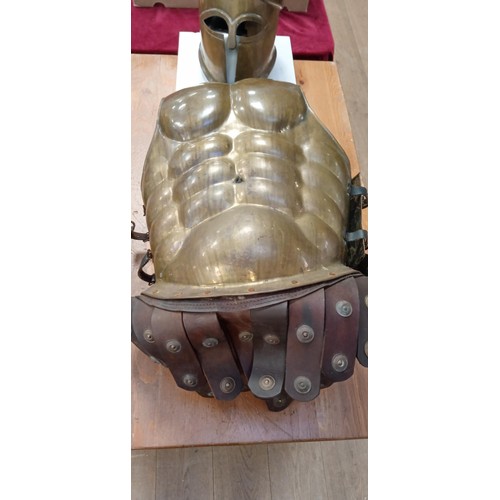 201 - Medieval helmet and body armour with leather trim