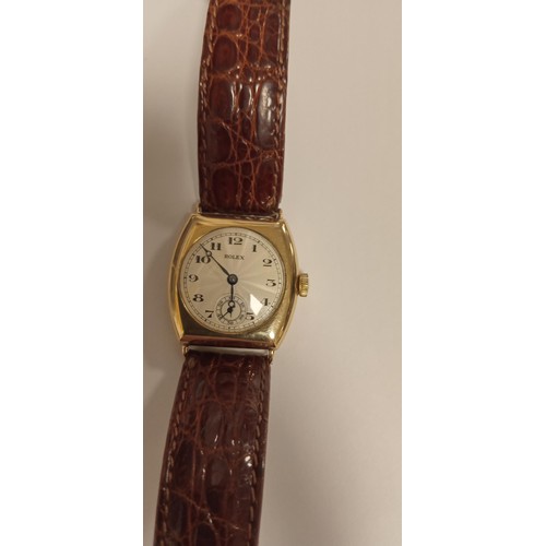 134A - Vintage 1930's 18 carat gold cushion backed Rolex watch in fully working order stamped inside and ou... 