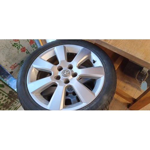 12 - Pair of 5 stud Vauxhall alloys plus one other