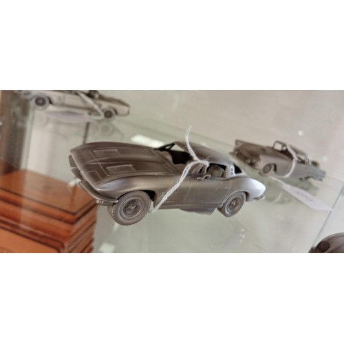 33 - Pewter cars to include Volvo 1800S, Shelby Mustang, Corvette, Thunderbird & Jaguar