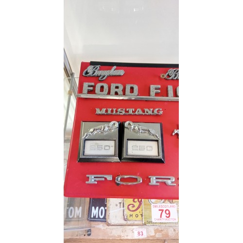 79 - Selection of Ford and Dodge badges