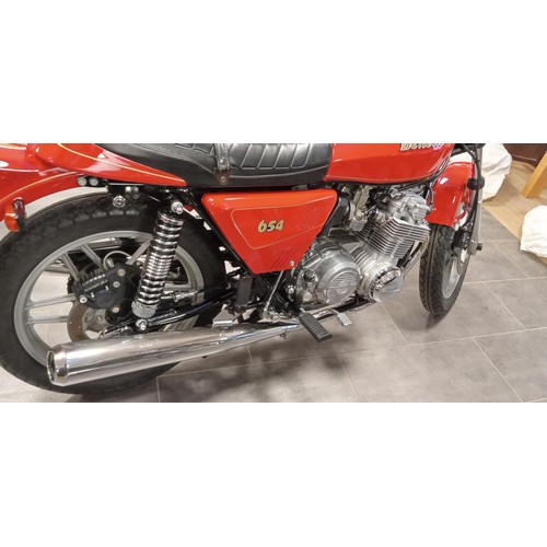 144 - Benelli 654 sport motorbike, 1982.  572km from new.  In original condition, this motorcycle has had ... 