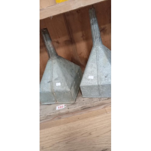 180 - Pair of vintage galvanised funnels