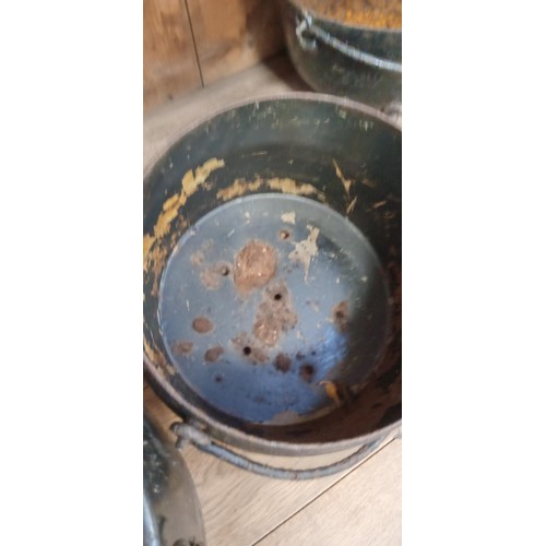 181 - 4 Cast iron cauldrons suitable for the garden as all have bases drilled through