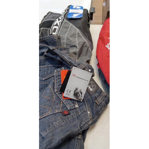 225 - Brand new bikers jeans with armour and bikers axel sport trousers both with tags