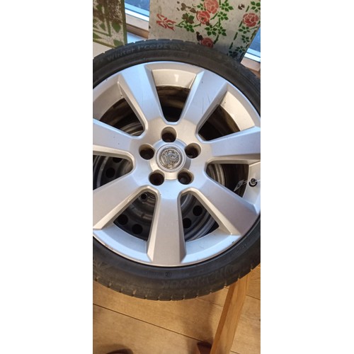 12 - Pair of 5 stud Vauxhall alloys plus one other