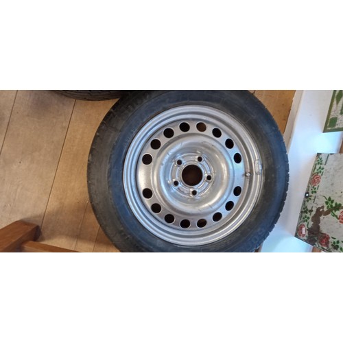 12 - Pair of 5 stud Vauxhall alloys plus one other