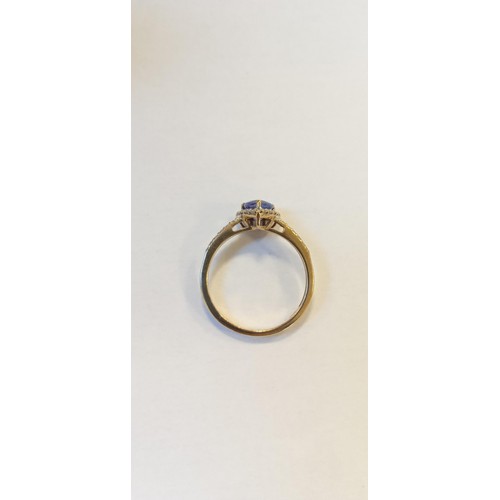 5 - 9ct gold with tanzanite and diamonds ring size R approx.