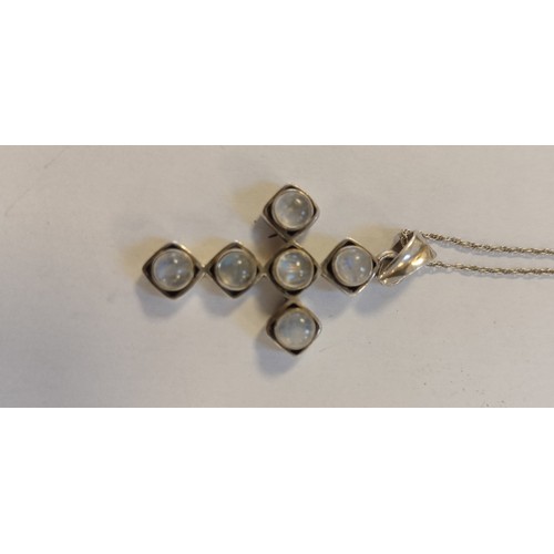 22 - Silver cross and chain with white stones