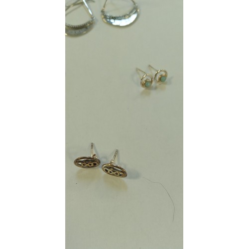 24 - 8 Pairs of silver earrings plus silver bangle