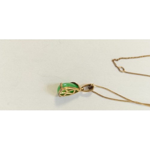 30 - Direct from deceased estate what appears to be small yellow metal necklace with green Gem,  and unch... 