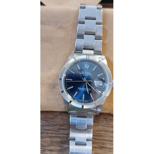 32 - Rolex Oyster Perpetual date Chronometer in steel with matching oyster bracelet and blue dial watch m... 