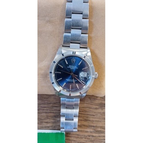 32 - Rolex Oyster Perpetual date Chronometer in steel with matching oyster bracelet and blue dial watch m... 