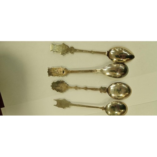 101 - 9 teaspoons plus a pickle fork some marked silver from different continents