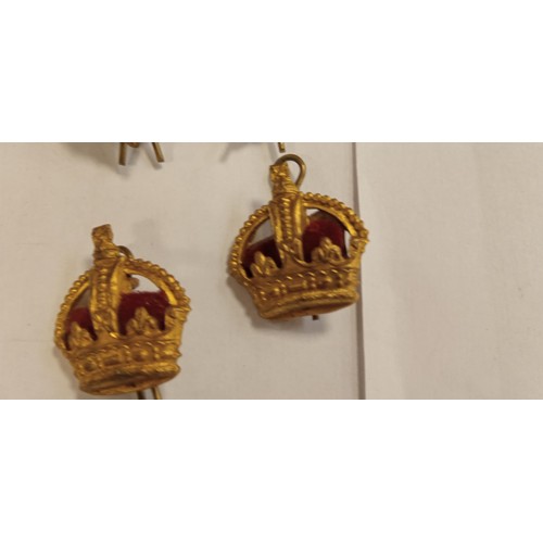 104 - 4 Military pin badges and 2 military cloth badges