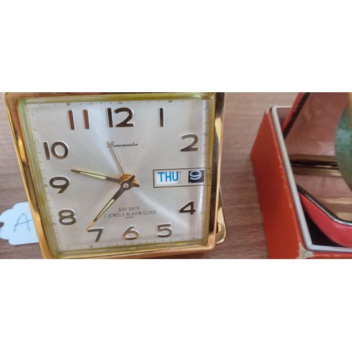 130 - 3 Vintage travel clocks Time Master, Coral & Europa