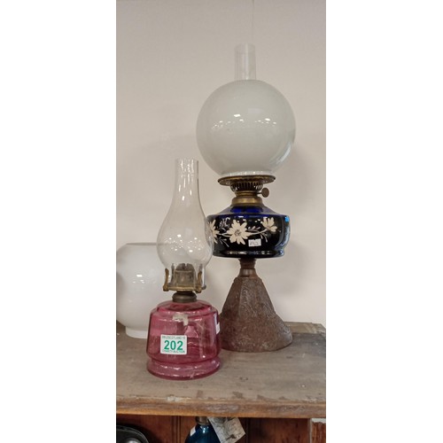 202 - Selection of vintage oil lamps