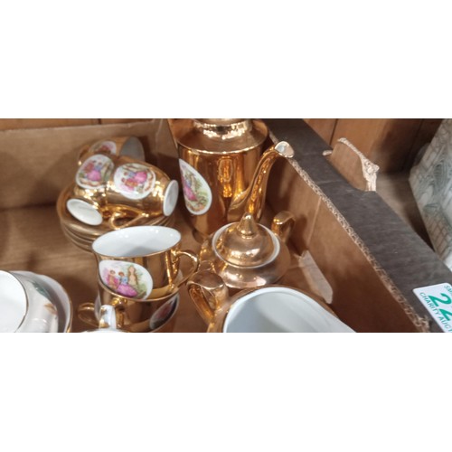 221 - Box of cups and saucers to include Royal Vale