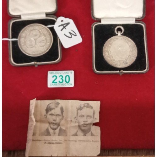 230 - 2 Solid silver 1930's Borough of Keith DUX medals in original cases