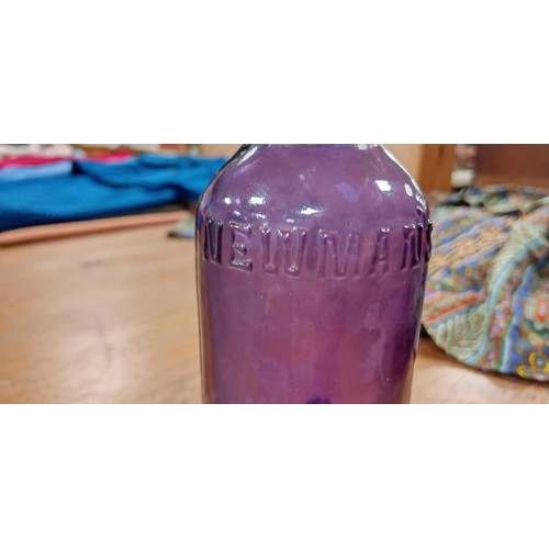 231 - Vintage Newmans Australian purple bottle very rare